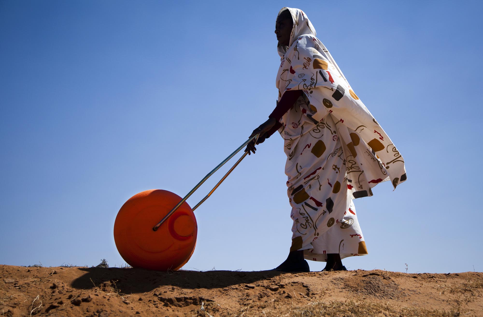 Darfuris Receive Efficient Water Rollers. Photo Credit: Flickr- Albert Gonzalez Farran- UNAMID
