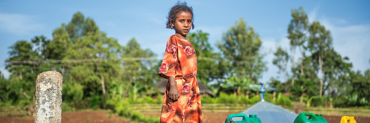 Girl Getting Water. Photo Credit: Nick Fox- Alamy Stock Photo Girl Getting Water. Photo Credit: Nick Fox- Alamy Stock Photo