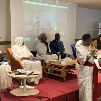 Panelists articulating their views on the need to enhance women’s participation in WASH.