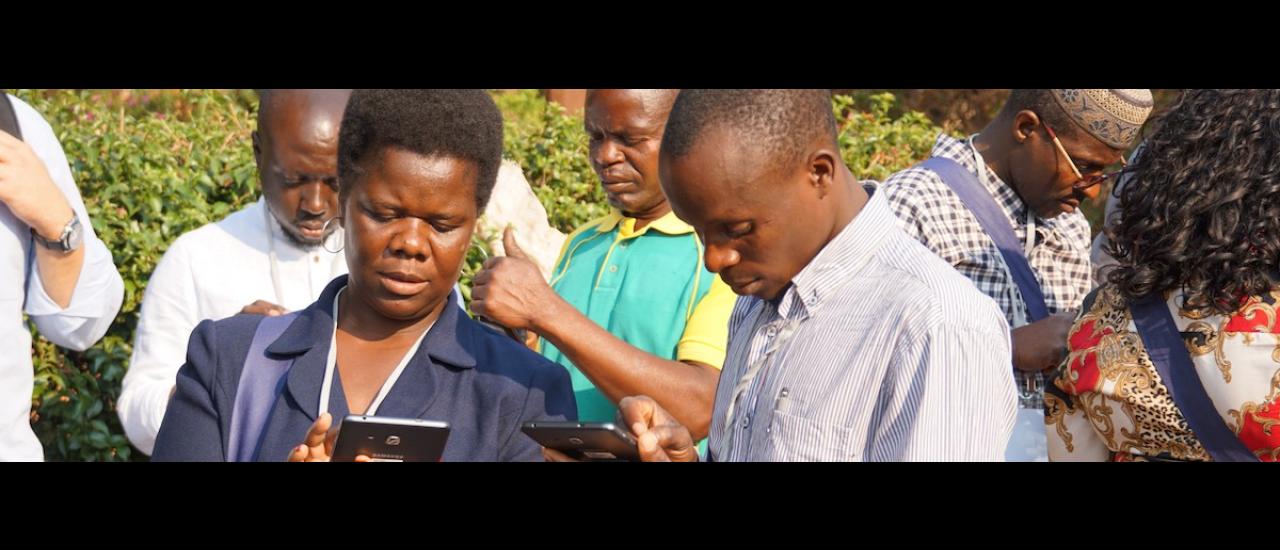 Data technicians in the Manica Province of Mozambique at a training to learn how to use the new m-SINAS tablets for mobile data collection. Photo credit: IWED Mozambique/ENGIRDO