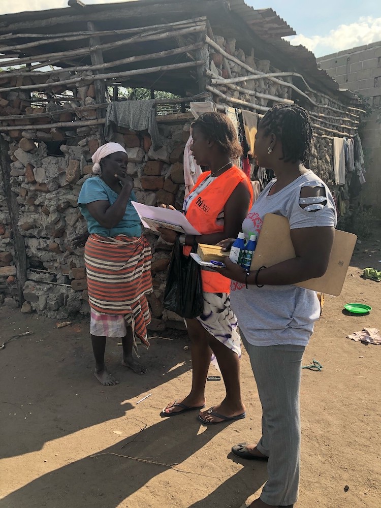 A WASH rapid response team in Dondo provides hygiene education, certeza, soap, and IEC materials to communities. Photo credit: CDC