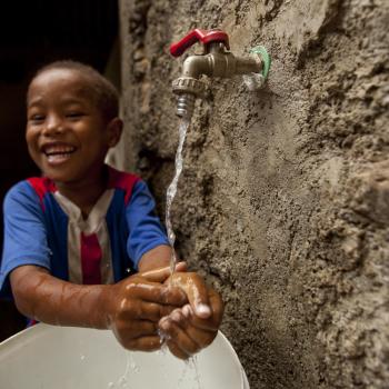 Water now comes directly to this boy’s home thanks to the Social Access Fund through MCC’s Cabo Verde Compact. Credit: MCC