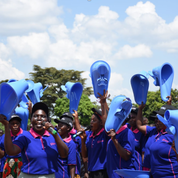 During World Toilet Day celebrations, the BRAC women hold sanitation products, such as SATO pans. Photo credit: Dorothy Nabatanzi