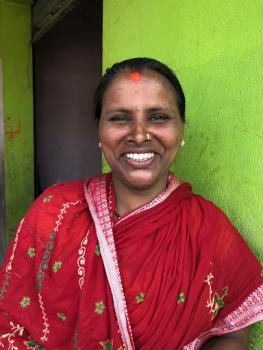 Smiles from a successful woman latrine sales agent in the Terai, Nepal.
