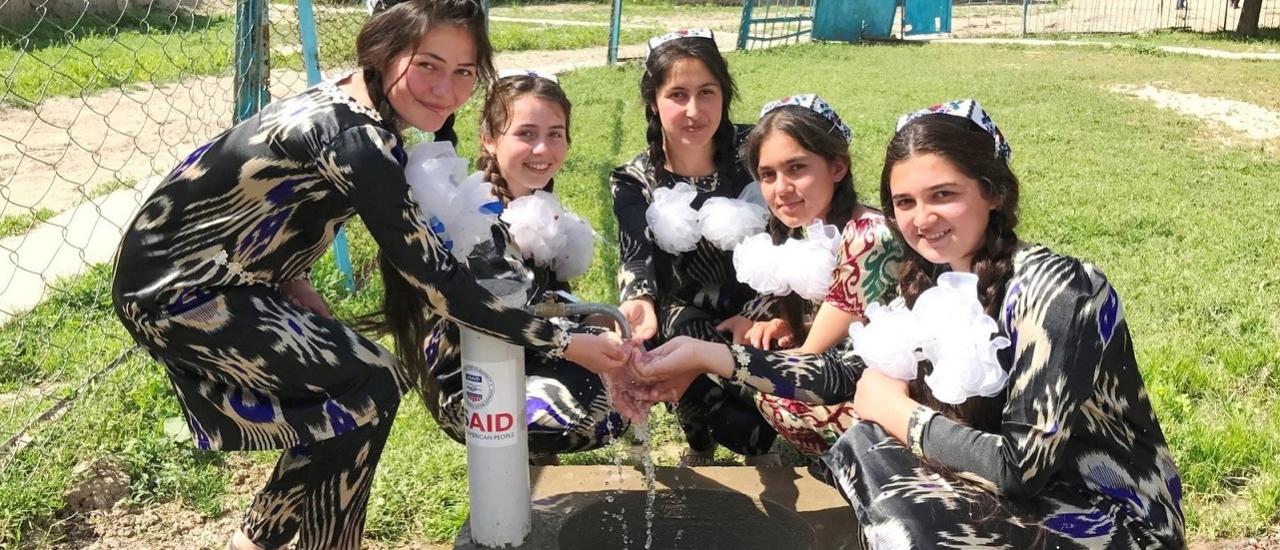 The local community school in Norak celebrates new access to clean drinking water, which reduces the risk of waterborne bacteria that cause diarrhea and typhoid.  Photo credit: Sayora Khalimova, USAID Development Outreach Communication Specialist Location: Norak, Sughd Province, Northern Tajikistan