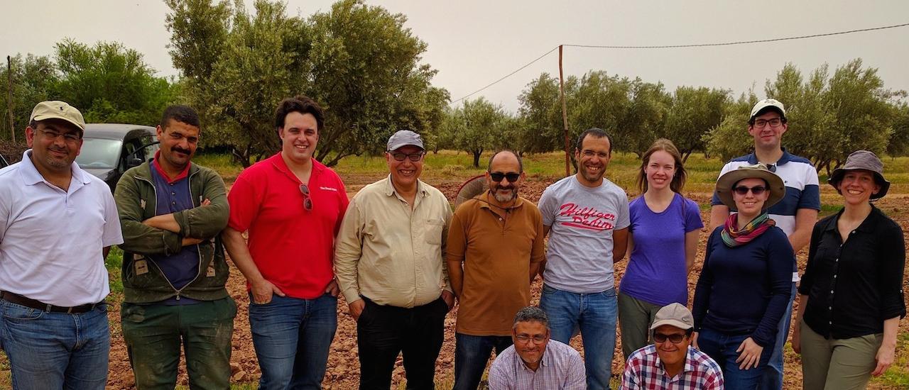 In Morocco, the MIT team with local implementing partners at the International Center for Agricultural Research in the Dry Areas and the Institut National de la Recherche Agronomique stand with a local farmer who will host a phase one field pilot. Photo Credit: MIT GEAR Lab