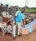 "Toilet King" Paul Kpadonou at his shop in the suburban town of Abomey-Calavi, Benin. Photo credit: PSI