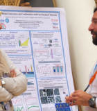 Participants discuss their research at the Arab-American Frontiers poster session. Photo Credit: National Academy of Sciences