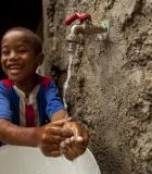 Water now comes directly to this boy’s home thanks to the Social Access Fund through MCC’s Cabo Verde Compact. Credit: MCC