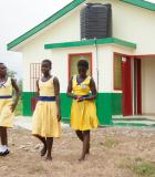 Schoolgirls in Ghana exiting a new toilet facility, made possible by the Improved WASH in Ghana project by the Water and Development Alliance (WADA). Photo credit: WADA