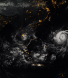 What does climate change look like? Here, one of the strongest tropical storms ever recorded, Typhoon Haiyan, approaches the Philippines in a November 2013 composite image incorporating data captured by the geostationary satellites of the Japan Meteorological Agency (MTSat 2) and EUMETSAT (Meteosat-7), overlaid with NASA’s ‘Black Marble’ imagery. Photo credit: JMA/EUMETSAT