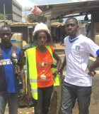 Judith poses with two of her colleagues at a construction site in Abidjan. Photo credit: Olivier Konan 