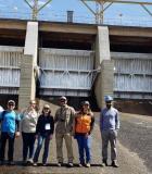 Dam safety training participants pose at the Paranoa Dam spillway gates in Brazil. Photo credit: USGS