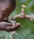Increasing access to water supply and sanitation services in Africa. Photo Credit: Riccardo Nielsmayer